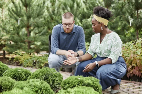 Landscaper talking with client